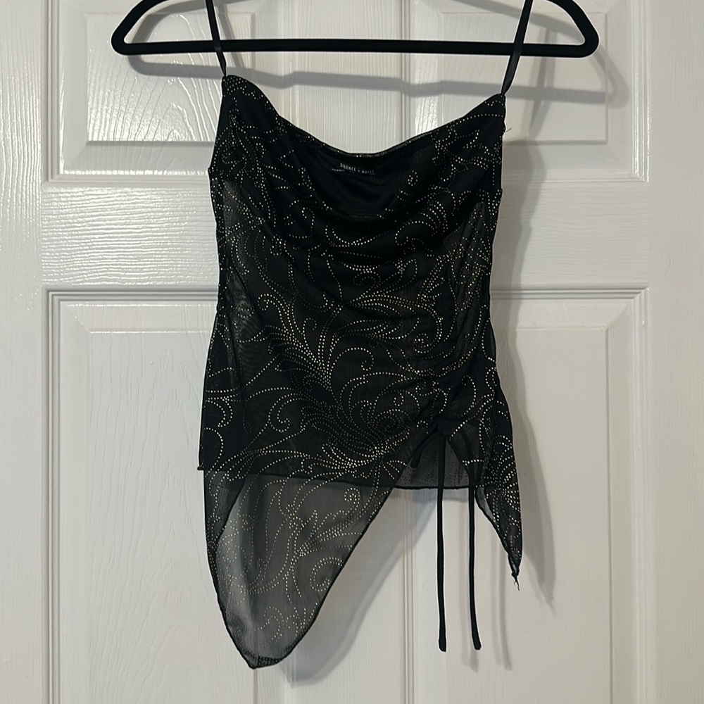 Strapless black and bedazzled top. Tried on never worn